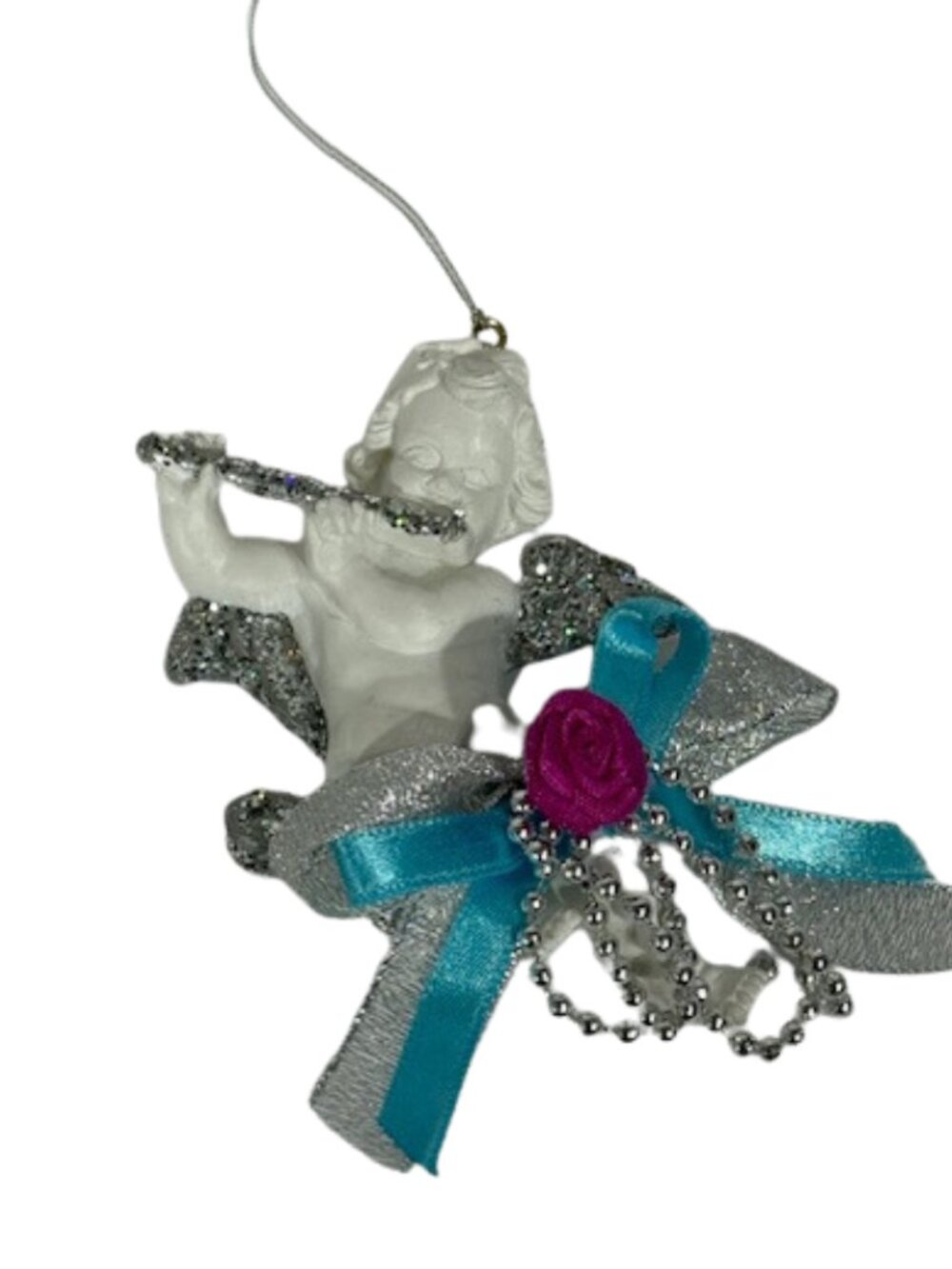 Cherub/angel playing flute Christmas ornament. Signed